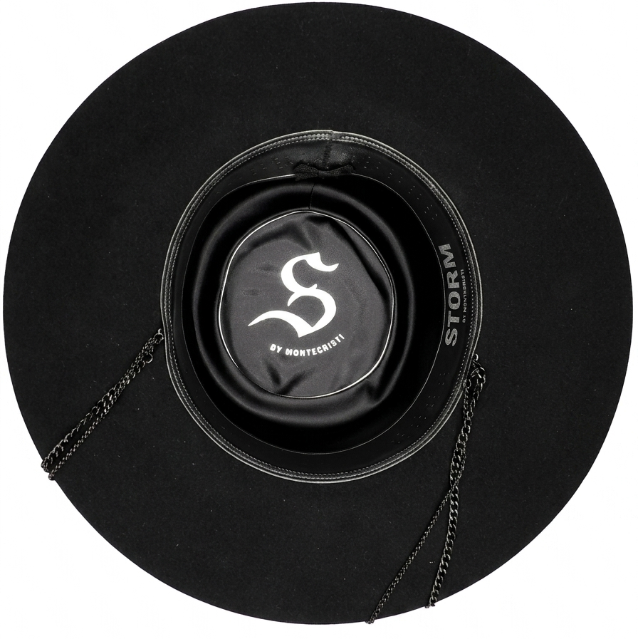 Underside view of The Noir black beaver hat by Storm, showcasing the leather sweatband, satin lining, and chain chin strap attachments.