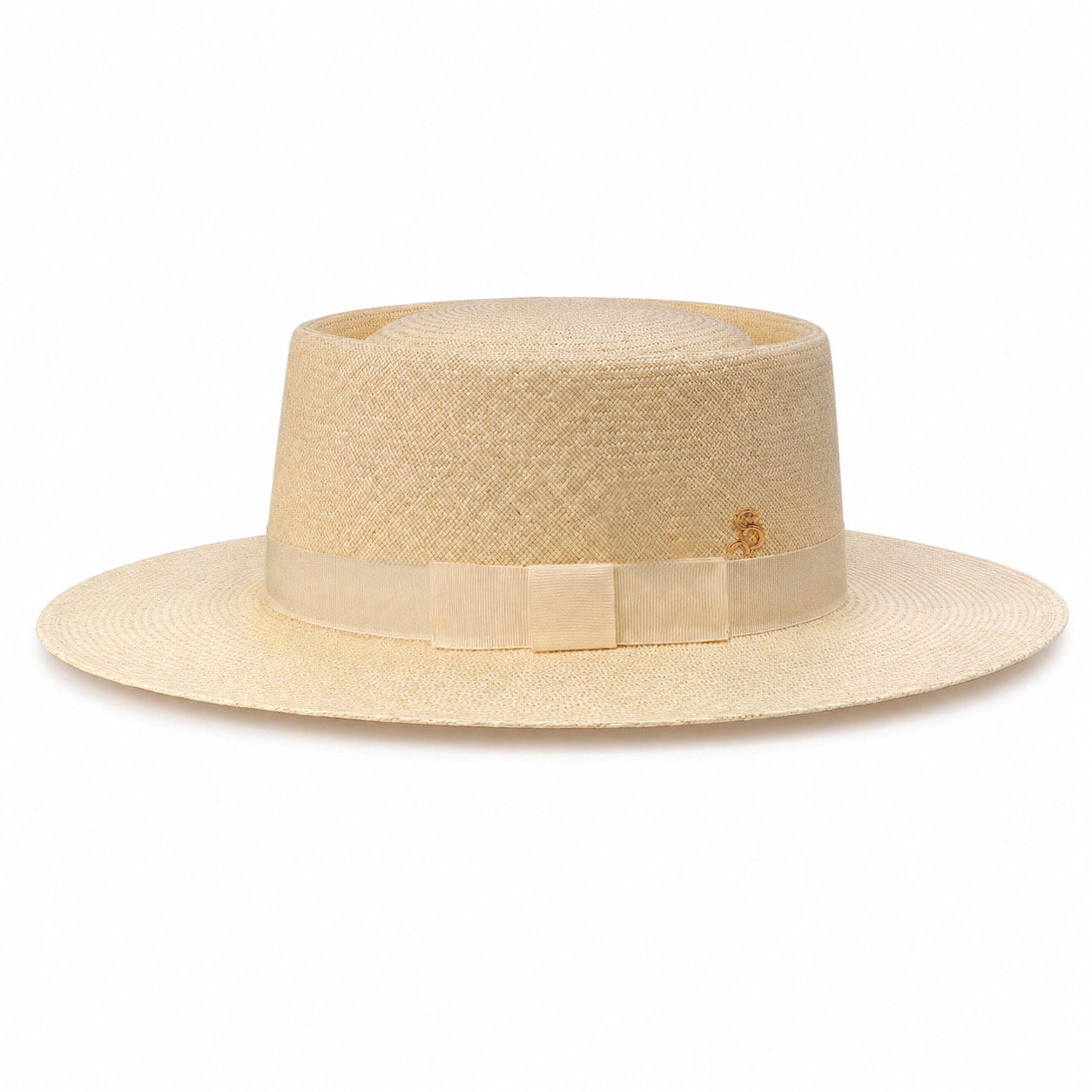 Side view of 505 Colombian straw hat by Storm, showcasing a telescope crown, flat brim, and a chic Alabaster Cream grosgrain ribbon with a modern block bow.