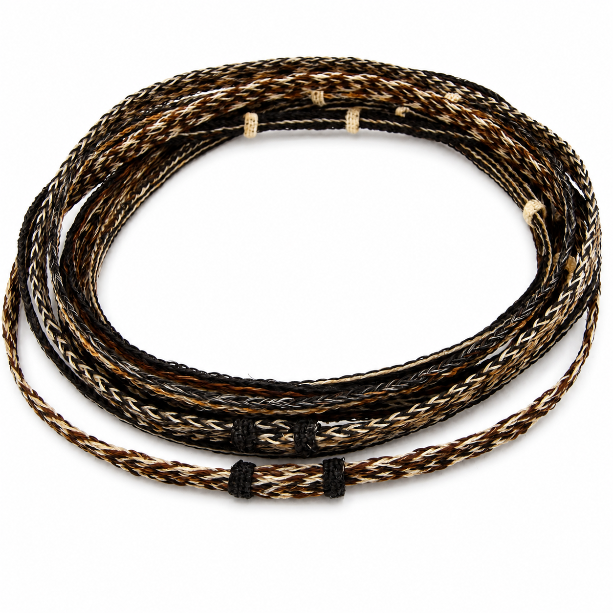 A coiled braided rope accessory made of mixed natural brown, black, and tan horsehair, with sliding bands for adjustable sizing and black tie knots.